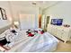 Bedroom with queen bed and Mickey Mouse decor at 8848 Candy Palm Rd, Kissimmee, FL 34747