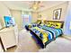 Minion-themed bedroom with two twin beds and a TV at 8848 Candy Palm Rd, Kissimmee, FL 34747