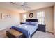 Spacious bedroom with king-size bed and large windows at 133 Summer Place Loop, Clermont, FL 34714