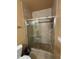 Bathroom with shower stall and tiled walls at 1351 Tuscan Ter # 8401, Davenport, FL 33896