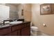 Bathroom with granite countertop vanity and shower at 1351 Tuscan Ter # 8401, Davenport, FL 33896
