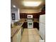 Modern kitchen with granite countertops and stainless steel appliances at 1351 Tuscan Ter # 8401, Davenport, FL 33896