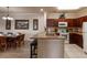 Well-equipped kitchen with granite counters and wooden cabinets at 1351 Tuscan Ter # 8401, Davenport, FL 33896