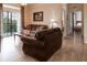 Spacious living room with comfortable sofas and hardwood floors at 1351 Tuscan Ter # 8401, Davenport, FL 33896