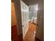 Bathroom with toilet and a tub with sliding glass doors at 13560 Turtle Marsh Loop # 319, Orlando, FL 32837