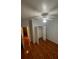 Neutral bedroom featuring tiled flooring, ceiling fan, and closet for organized storage at 13560 Turtle Marsh Loop # 319, Orlando, FL 32837