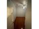 Bedroom with tile floors, ceiling fan, and view into the hall at 13560 Turtle Marsh Loop # 319, Orlando, FL 32837