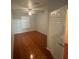 Well-lit bedroom with tile floors and ceiling fan at 13560 Turtle Marsh Loop # 319, Orlando, FL 32837