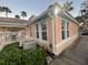 Building exterior with landscaping and AC unit at 13560 Turtle Marsh Loop # 319, Orlando, FL 32837