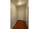 Hallway entry showing the front door to the unit and tile floors at 13560 Turtle Marsh Loop # 319, Orlando, FL 32837