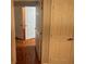 Hallway leading to several rooms with white doors and trim at 13560 Turtle Marsh Loop # 319, Orlando, FL 32837