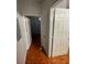 Bright hallway with doors to bedrooms at 13560 Turtle Marsh Loop # 319, Orlando, FL 32837
