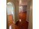Hallway showing tile floors leading to a kitchen and living room at 13560 Turtle Marsh Loop # 319, Orlando, FL 32837