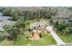 Aerial view of a two-story house, showcasing its landscaping and location at 1437 Pecos Dr, Ormond Beach, FL 32174