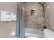 Small bathroom with shower/tub combo and tile surround at 1437 Pecos Dr, Ormond Beach, FL 32174