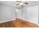 Bedroom with wood flooring and double door closet at 1437 Pecos Dr, Ormond Beach, FL 32174
