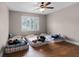 Bedroom with three twin beds and wood flooring at 1437 Pecos Dr, Ormond Beach, FL 32174