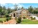 Two-story house with landscaped yard and walkway at 1437 Pecos Dr, Ormond Beach, FL 32174