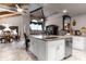 Spacious kitchen featuring granite countertops, stainless steel appliances, and white cabinetry at 1437 Pecos Dr, Ormond Beach, FL 32174