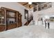 Open living space with high ceilings, entertainment center and staircase at 1437 Pecos Dr, Ormond Beach, FL 32174