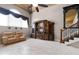 Living room with wooden entertainment center and comfortable seating at 1437 Pecos Dr, Ormond Beach, FL 32174