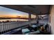 Relaxing screened balcony with sunset views over the lake at 16750 Sanctuary Dr, Winter Garden, FL 34787