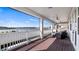 Screened balcony overlooking lake and tennis courts; perfect for relaxing at 16750 Sanctuary Dr, Winter Garden, FL 34787