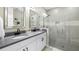 Elegant bathroom with dual vanity, large walk-in shower, and modern fixtures at 16750 Sanctuary Dr, Winter Garden, FL 34787