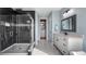 Bathroom with a walk-in shower and modern vanity at 16750 Sanctuary Dr, Winter Garden, FL 34787