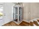 Modern home elevator conveniently located near the stairs and entry at 16750 Sanctuary Dr, Winter Garden, FL 34787