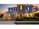 Two-story home with stone accents and a three-car garage at 16750 Sanctuary Dr, Winter Garden, FL 34787
