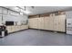 Organized garage with ample storage and epoxy flooring at 16750 Sanctuary Dr, Winter Garden, FL 34787