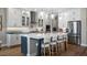 Spacious kitchen with island and stainless steel appliances at 16750 Sanctuary Dr, Winter Garden, FL 34787