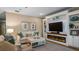Living Room with fireplace, built-in shelving, and comfortable seating at 16750 Sanctuary Dr, Winter Garden, FL 34787