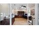 Home office with built-in cabinetry, hardwood floors, and plenty of natural light at 16750 Sanctuary Dr, Winter Garden, FL 34787