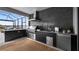 Outdoor kitchen with grill, sink, and lake view at 16750 Sanctuary Dr, Winter Garden, FL 34787