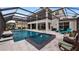 Resort-style pool and spa with covered patio at 16750 Sanctuary Dr, Winter Garden, FL 34787