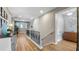 Bright hallway featuring hardwood floors and an open feel at 16750 Sanctuary Dr, Winter Garden, FL 34787