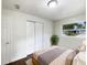 Charming bedroom with double door closet and hardwood floors at 1810 Selleen Dr, Eustis, FL 32726