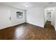 Bright living room featuring dark brown tile floors and an open floor plan at 1810 Selleen Dr, Eustis, FL 32726