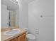 Simple bathroom with a single sink and toilet at 204 Paloma Dr, Davenport, FL 33837