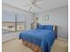 Well-lit bedroom with ceiling fan and large window at 204 Paloma Dr, Davenport, FL 33837