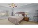 Spacious bedroom with large window and ceiling fan at 204 Paloma Dr, Davenport, FL 33837