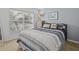 Comfortable bedroom with window and dresser at 204 Paloma Dr, Davenport, FL 33837