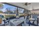 Covered patio with fire pit and foosball table at 20811 Sullivan Ranch Blvd, Mount Dora, FL 32757