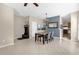 Open dining room with a table and chairs near the kitchen at 20811 Sullivan Ranch Blvd, Mount Dora, FL 32757