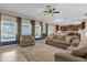 Relaxing living room with comfortable seating and kitchen views at 20811 Sullivan Ranch Blvd, Mount Dora, FL 32757