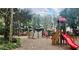 playground with play structures and shaded areas at 20811 Sullivan Ranch Blvd, Mount Dora, FL 32757