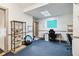Spacious bedroom with a skylight, desk area, and built-in shelving at 211 Indiana Ave, St Cloud, FL 34769