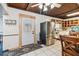 Bright kitchen featuring a stainless steel refrigerator and custom cabinetry at 211 Indiana Ave, St Cloud, FL 34769